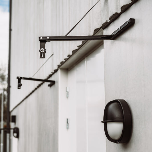 Stumt Dörrstopp FKR Grå – Vändbart och Platsbesparande Dörrstopp i Stål